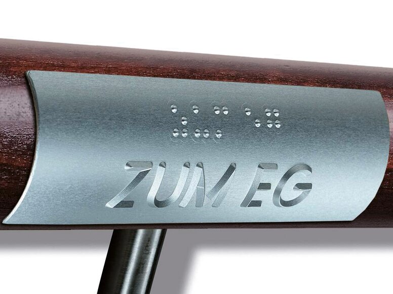 ENTRO handrail signage for visual impairment Wooden handrail with signage in Braille and pyramid lettering