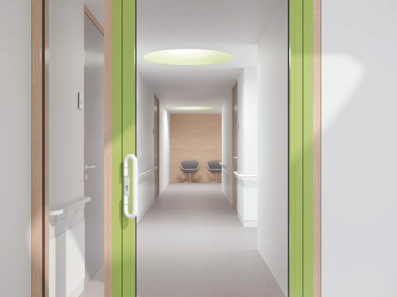 HEWI lever handle signal white Glazed hospital door with green frame equipped with a lever handle in the colour signal white made of polyamide