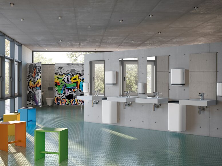 HEWI dispenser systems 477/801 Washbasin situation in a school with dispenser systems in white with black frame element