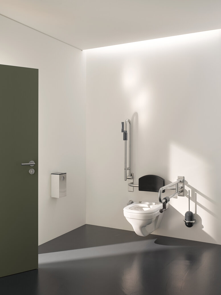 HEWI barrier-free WC Barrier-free WC in public areas equipped with folding support handles, back support and WC brush