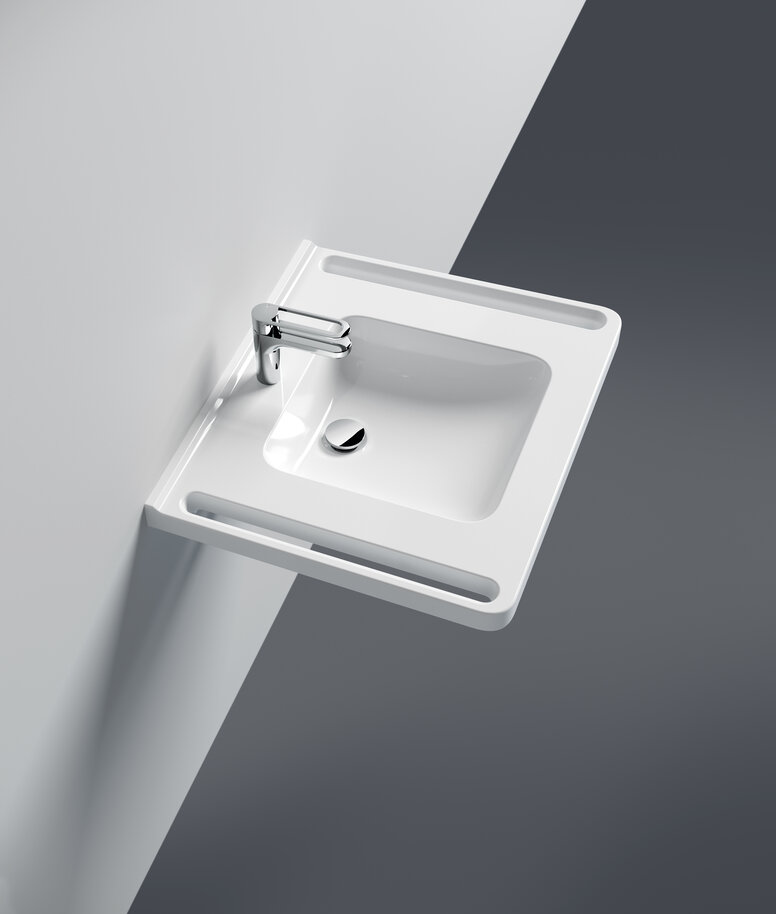 HEWI washbasin with handles Washbasin with integrated side handles and single lever tap in chrome